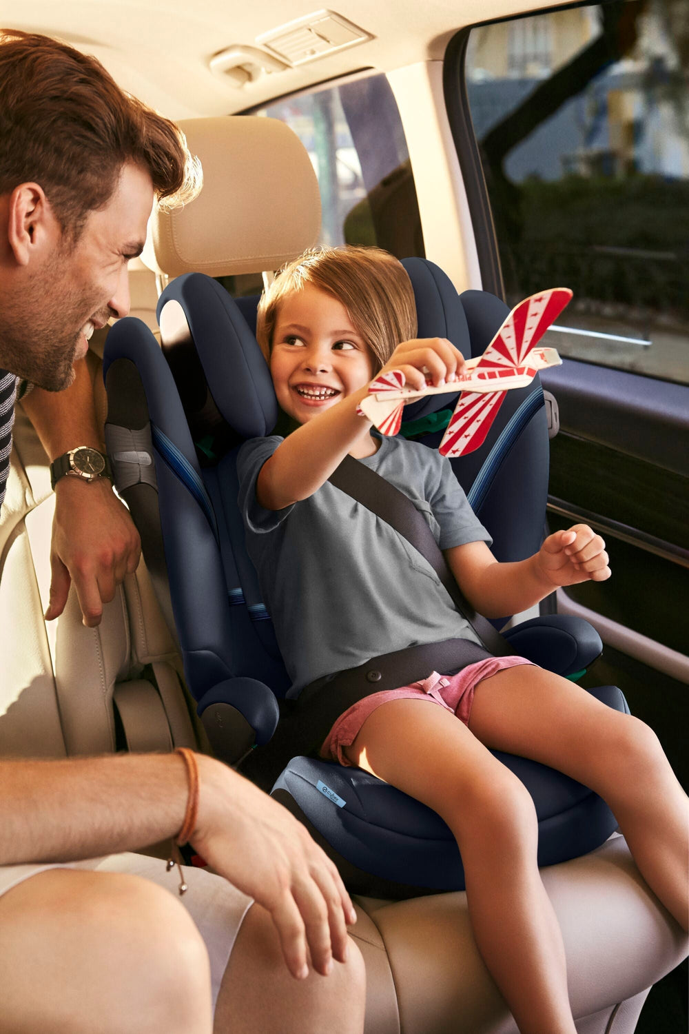 Child in cybex solution T Car Seat