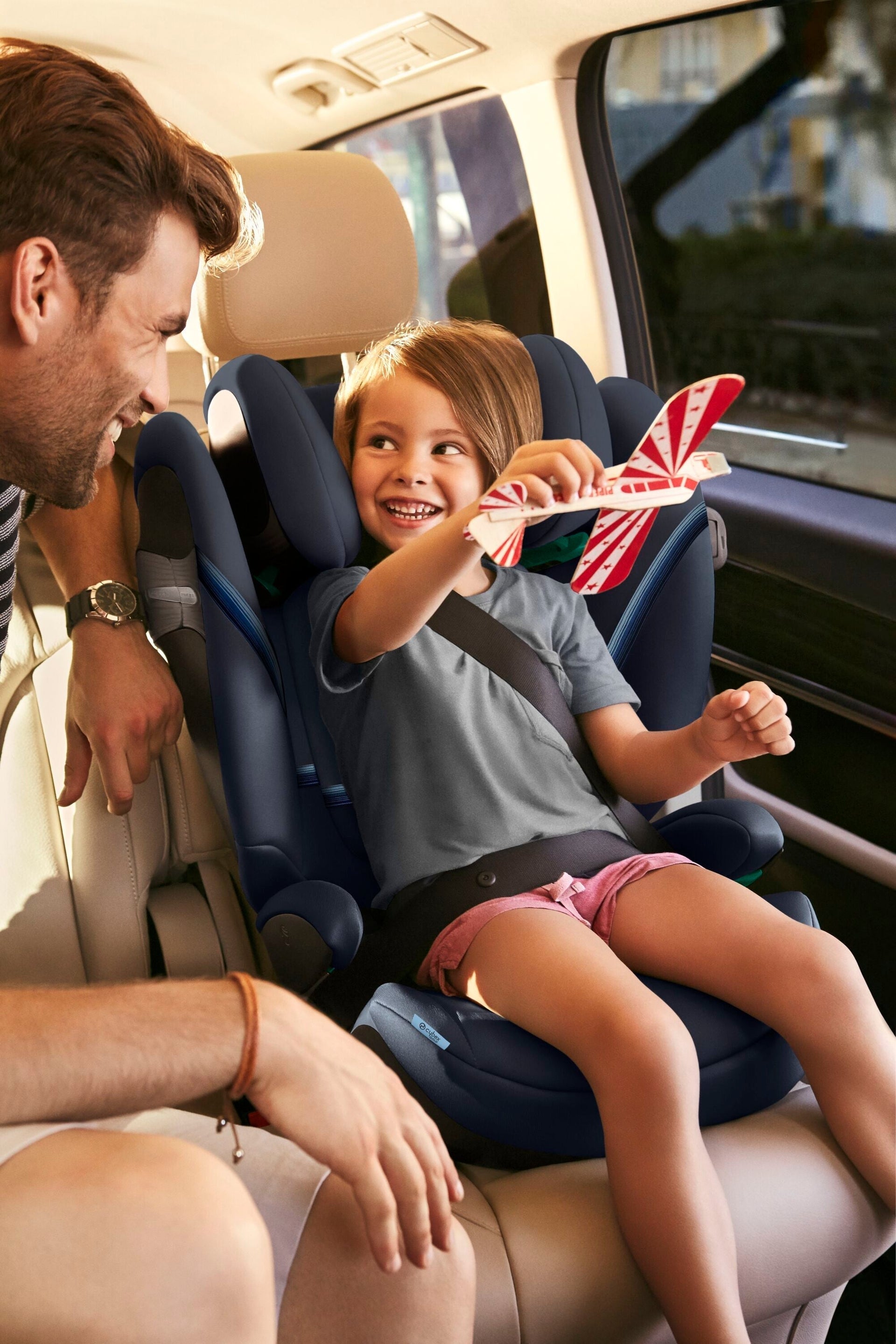 Child in cybex solution T Car Seat