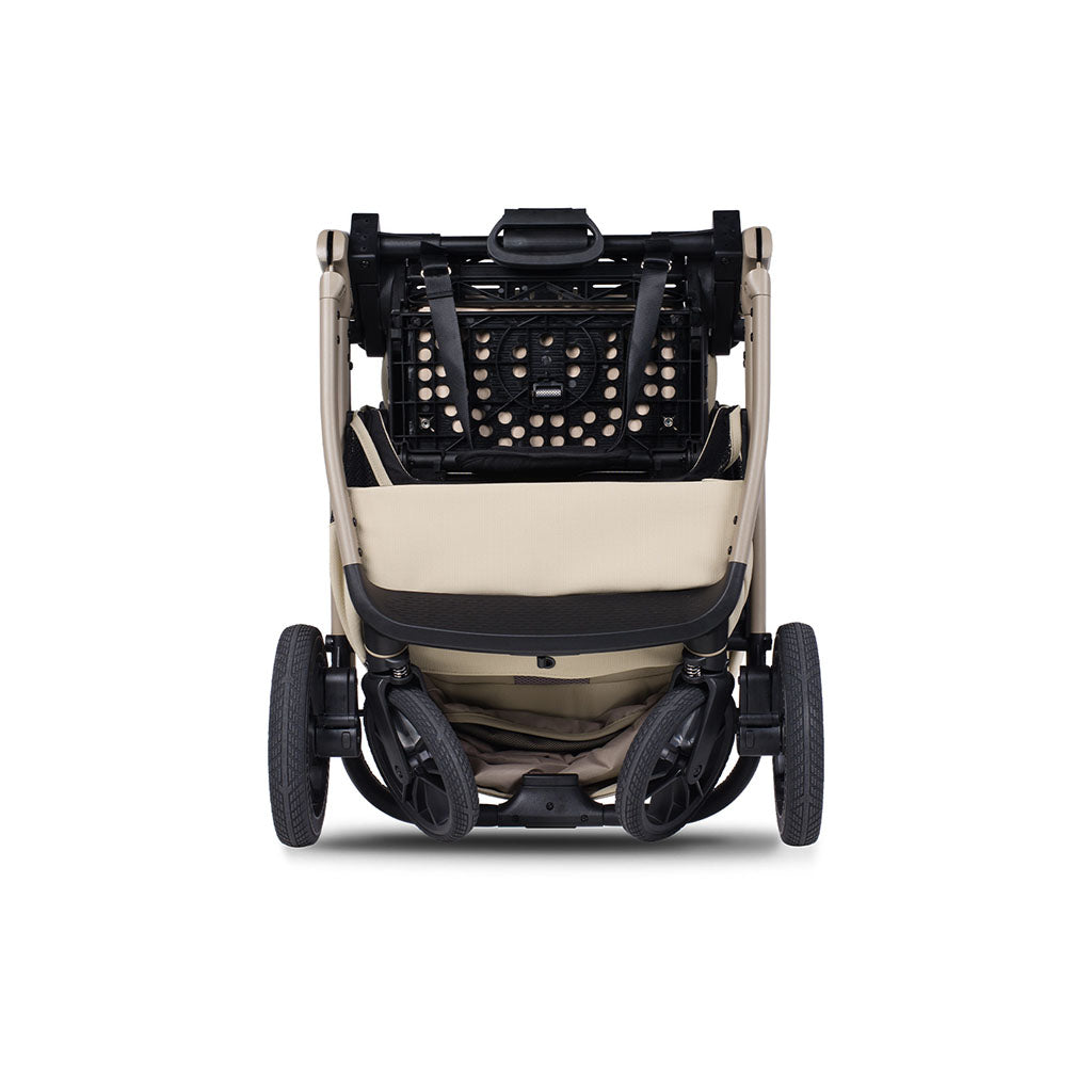 Beige and black stroller on a white background